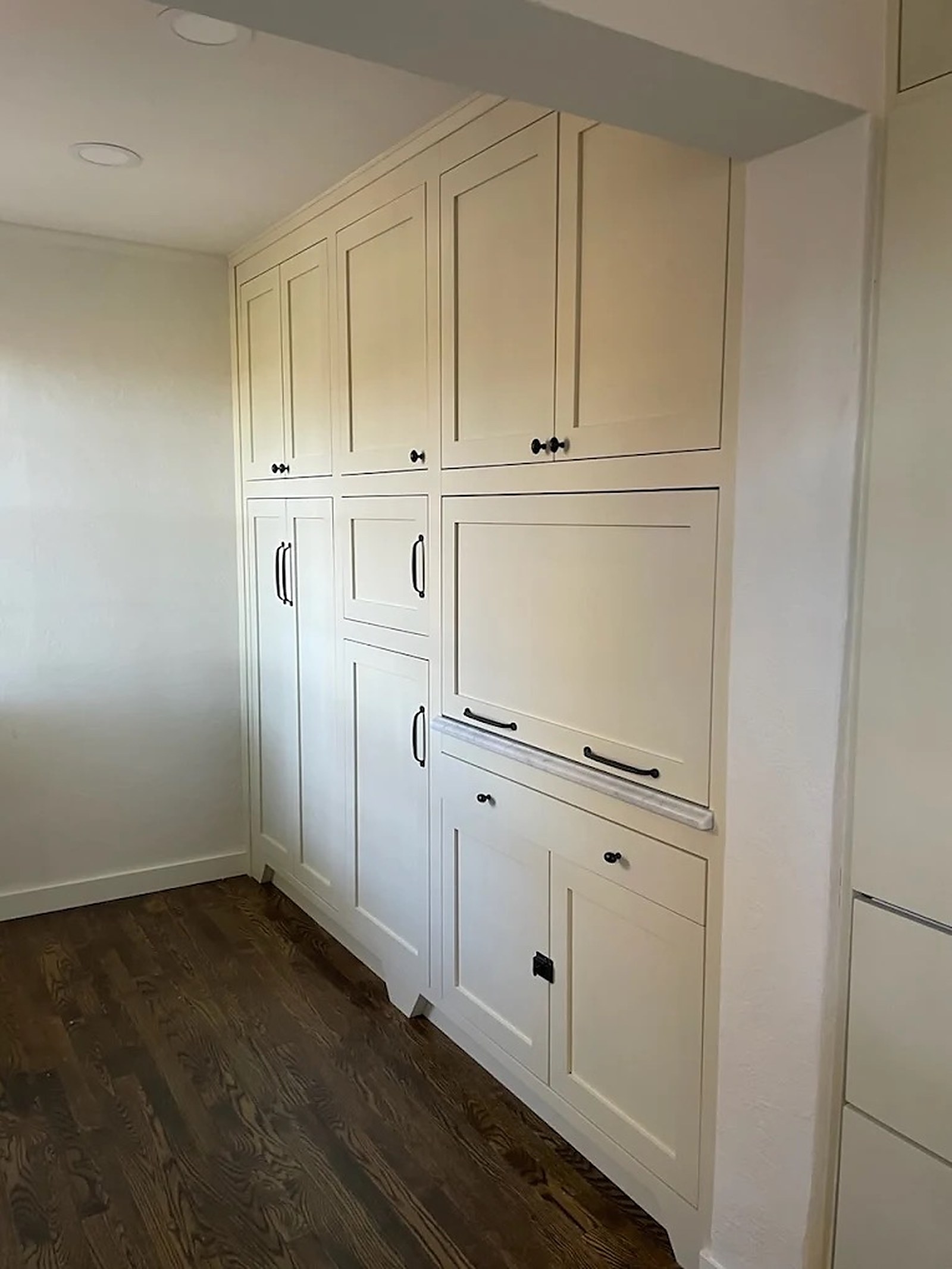 Cream shaker walk-in pantry with full-height storage
